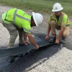 Petrotac self-adhesive pacing membrane installation on road