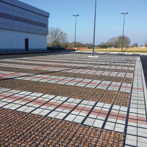 Ecoraster E40, E50, and Bloxx combined to create a porous surface to better manage stormwater runoff.