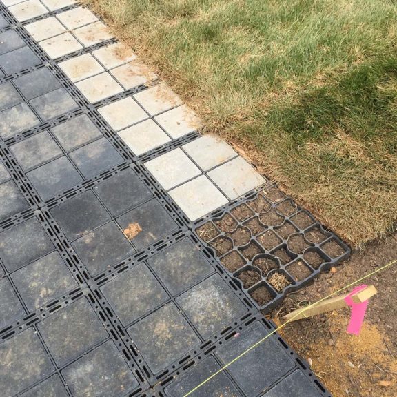 Mid-installation showcasing the ease of using innovative permeable surface solutions like Bloxx.