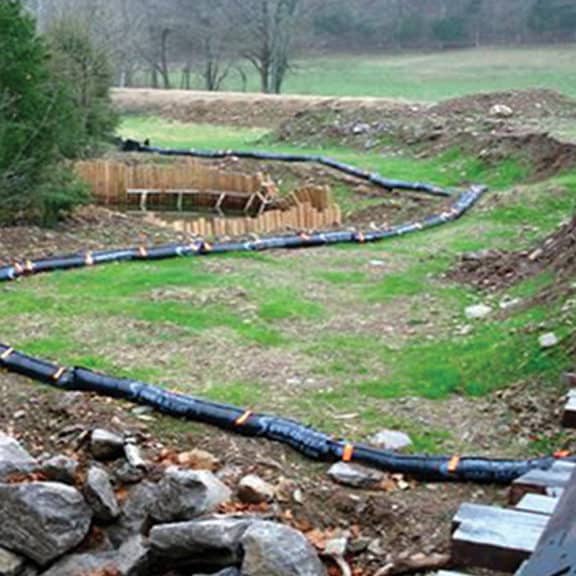 Erosion eels lining a construction site