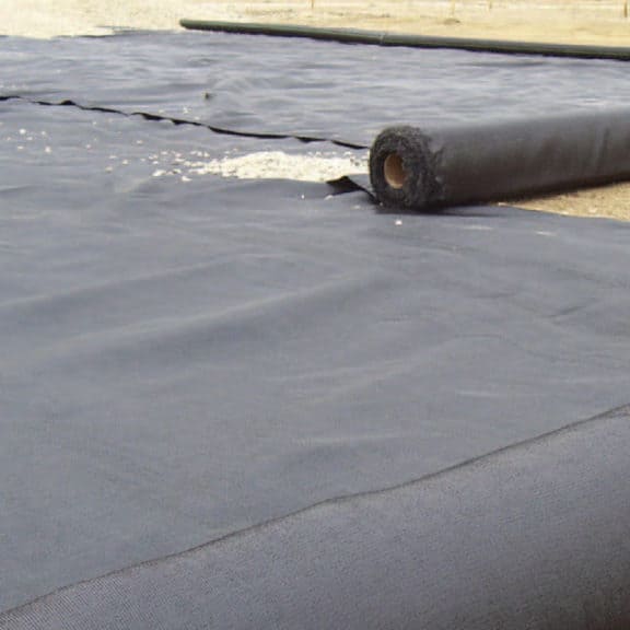 Large roll of Mirafi high-performance woven geotextile.