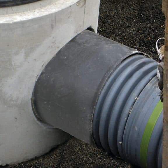 Corrugated HDPE Storm Pipe connecting to a subsurface storage vault