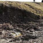 Erosion caused by hurricane surges in New Orleans before implementing hurricane stormwater solutions.