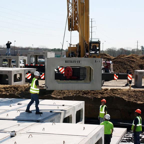 Engineer and construction professionals installing the Underground Detention System, RetainIT