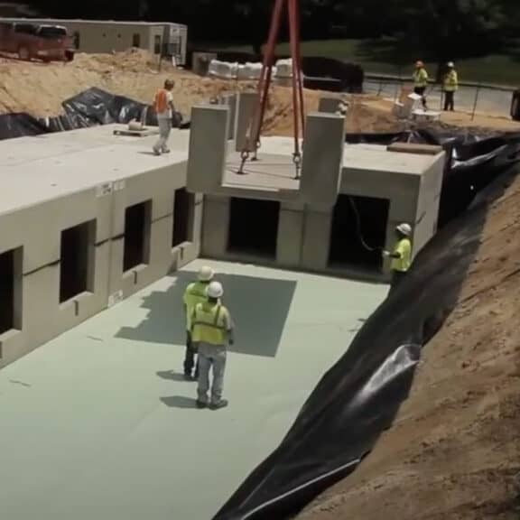 Workers installing Oldcastle StormCapture for below-ground water storage