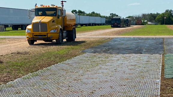 Large vehicles driving over the highest-performing geogrid, InterAx NX850, without causing rutting.