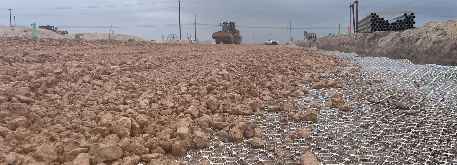 Tensar InterAx Geogrid providing stabilization for a new community development project.