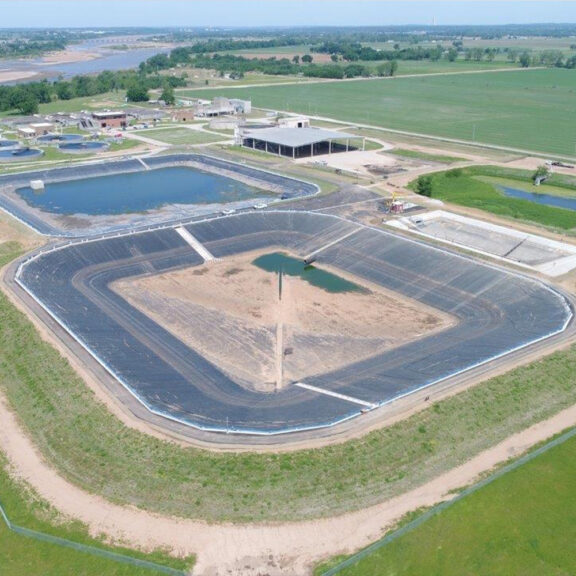 Waste water treatment area using geomembrane liners for pollution control