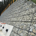 Natural stone blocks on the face of a retaining wall